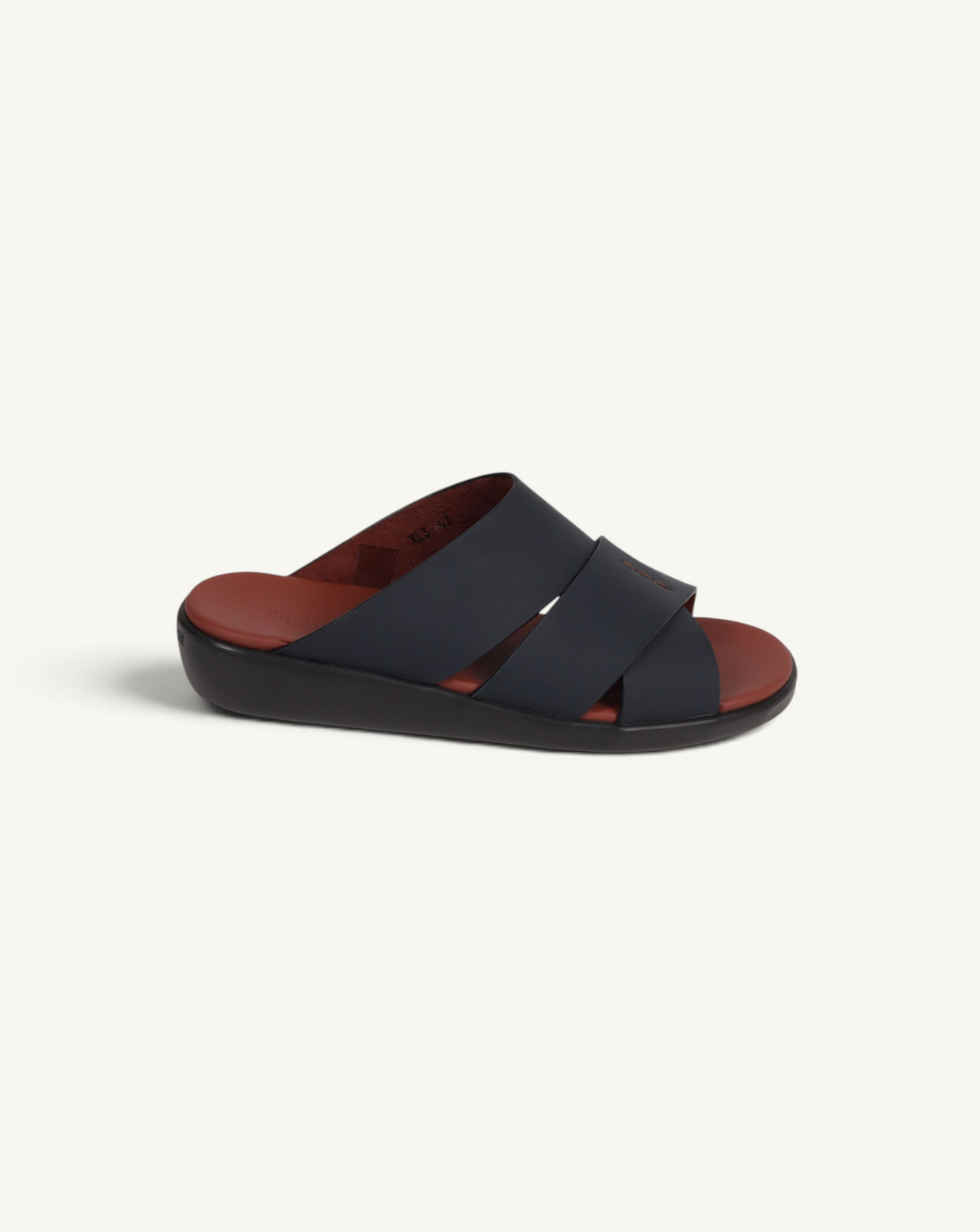 Prestige PG-XL3 slide sandals in dark blue gommato leather with a comfortable brown footbed and thick sole.