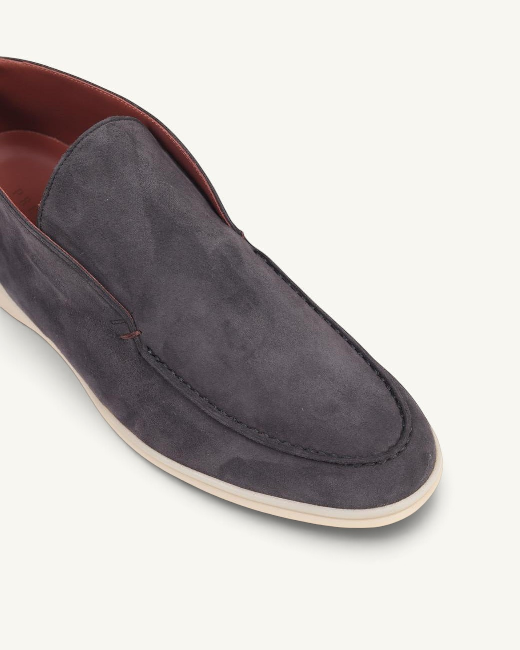Prestige PSL092S ankle boot in dark grey suede with a moccasin-style toe and a contrasting white rubber sole.