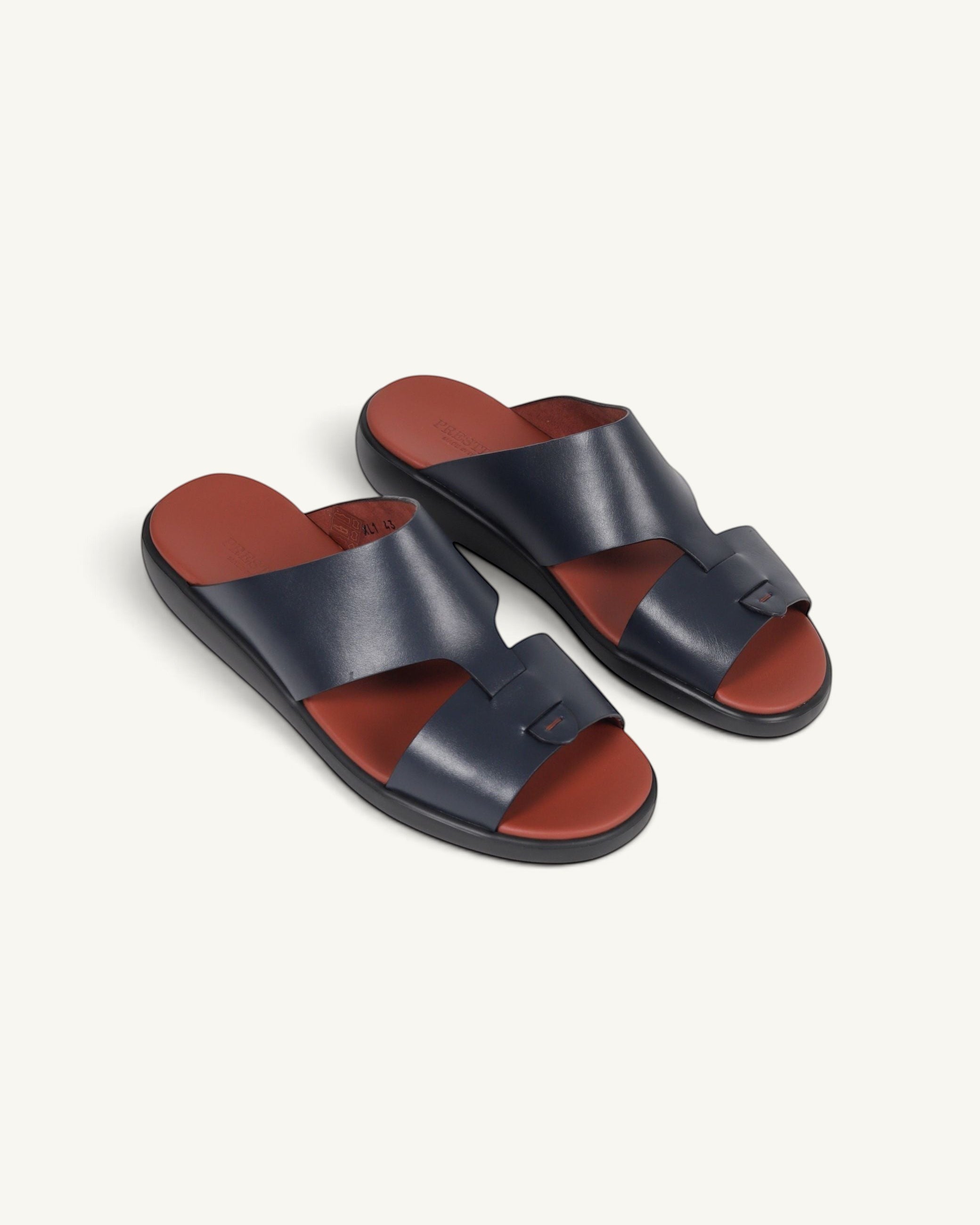Prestige men's extra light sandals in deep blue soft nappa calf leather with contrasting rust-colored footbeds.