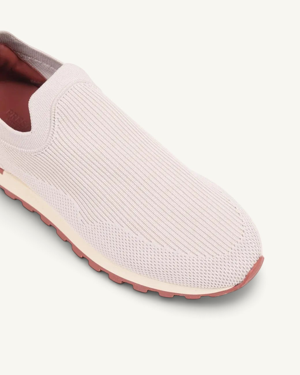Prestige Flexy Lux active beige slip-on sneakers featuring a ribbed knit upper and a durable lugged sole.