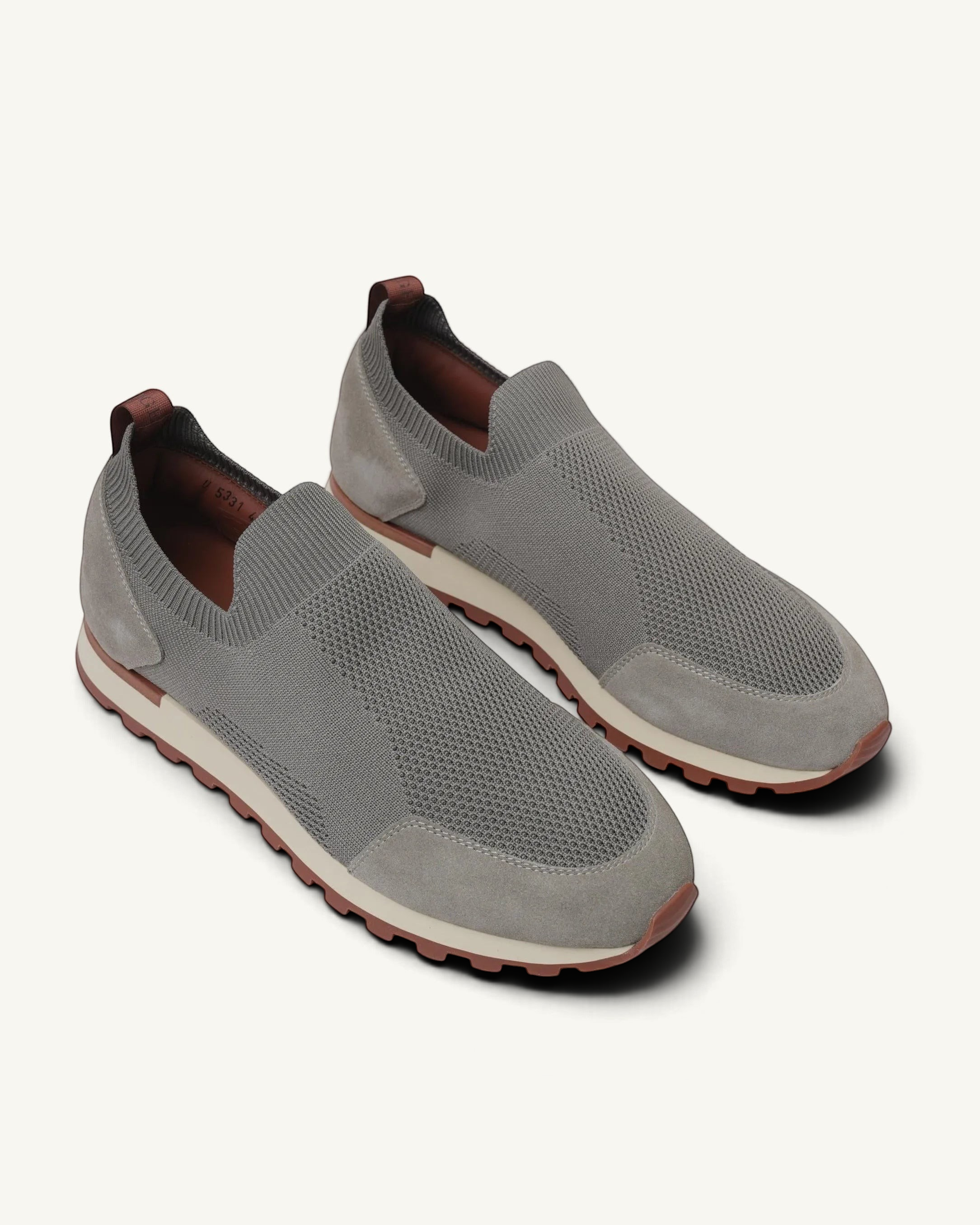 Prestige Flexy Lux active runners in dark grey featuring a breathable knit upper, suede overlays, and a lugged sole.
