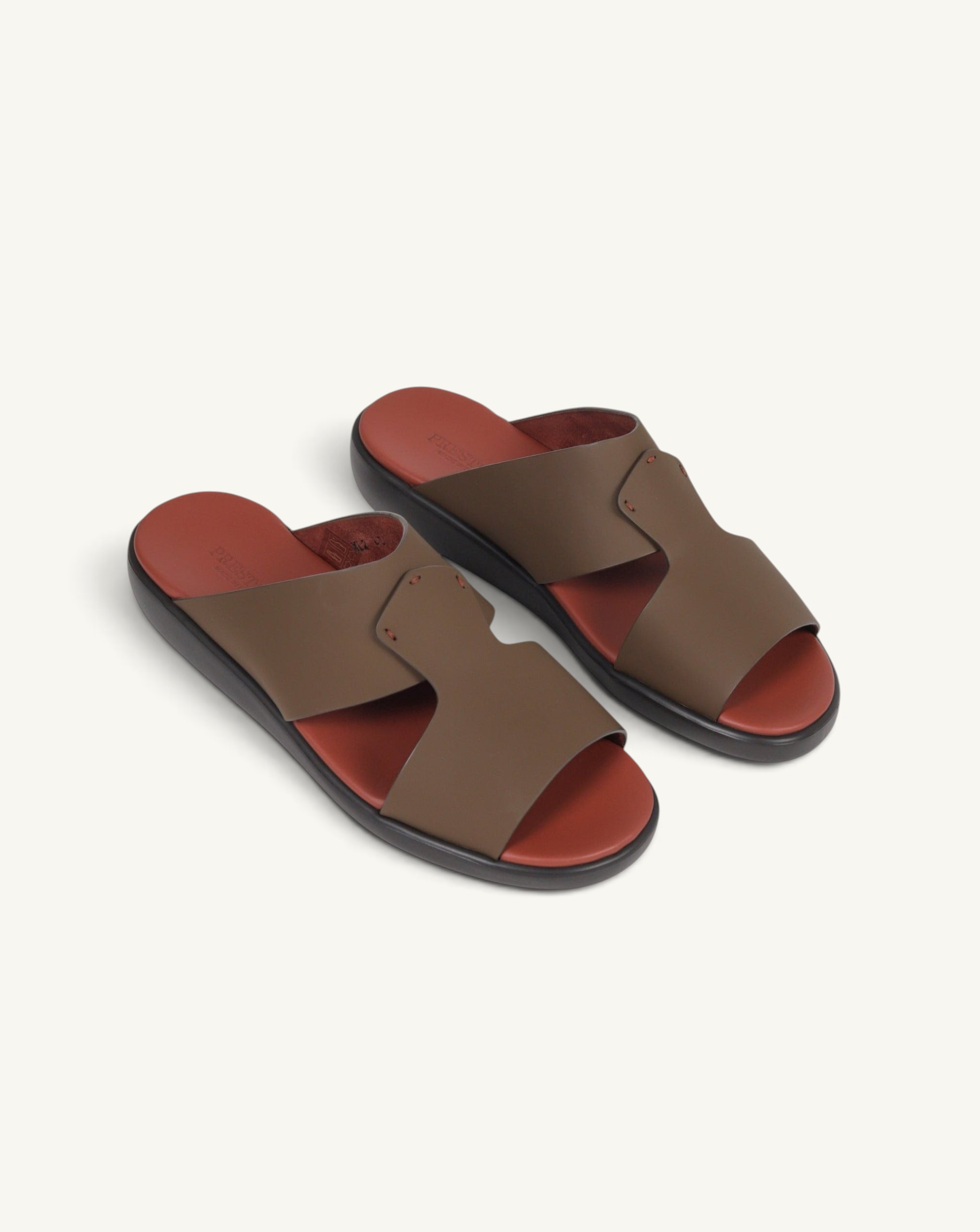 Prestige PG-XL2 Gommato copper slide sandals with brown leather straps and a contrasting red footbed