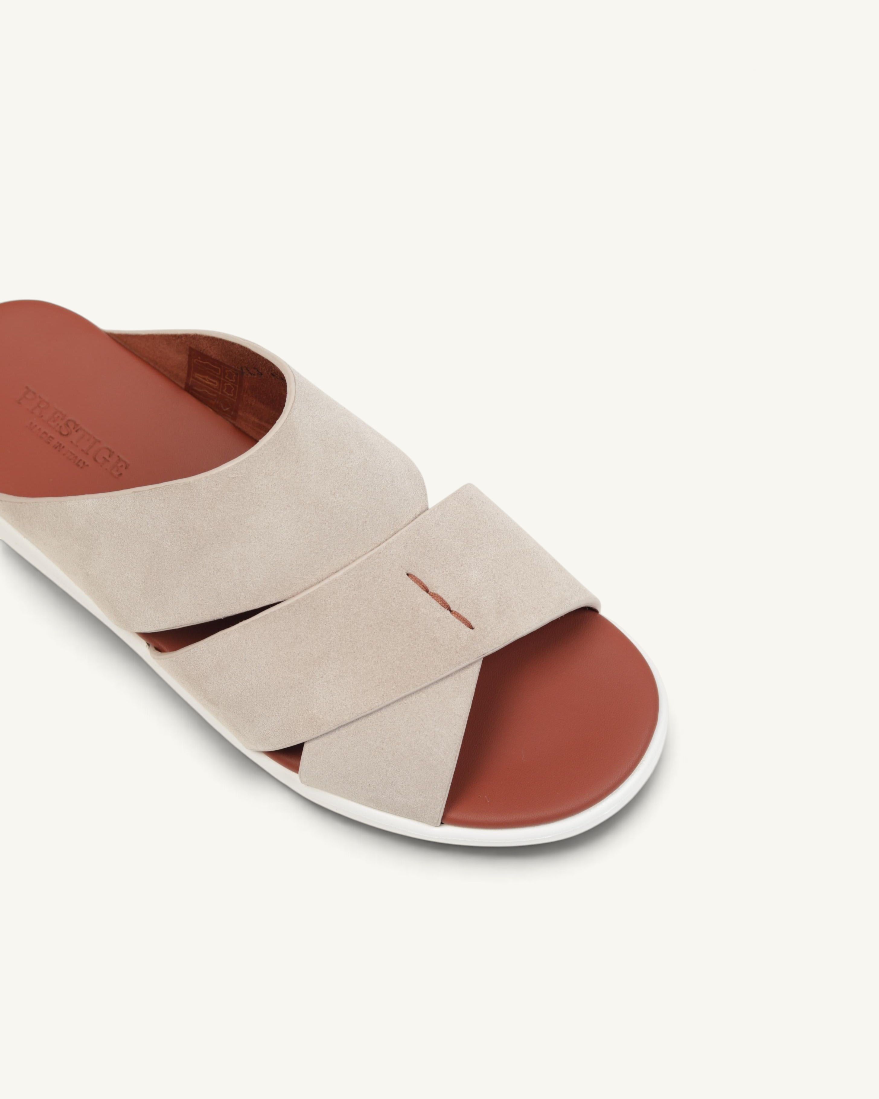 Prestige PVNL-XL3 velour sport slide in ivory with crisscross suede straps and a contrasting brown footbed.