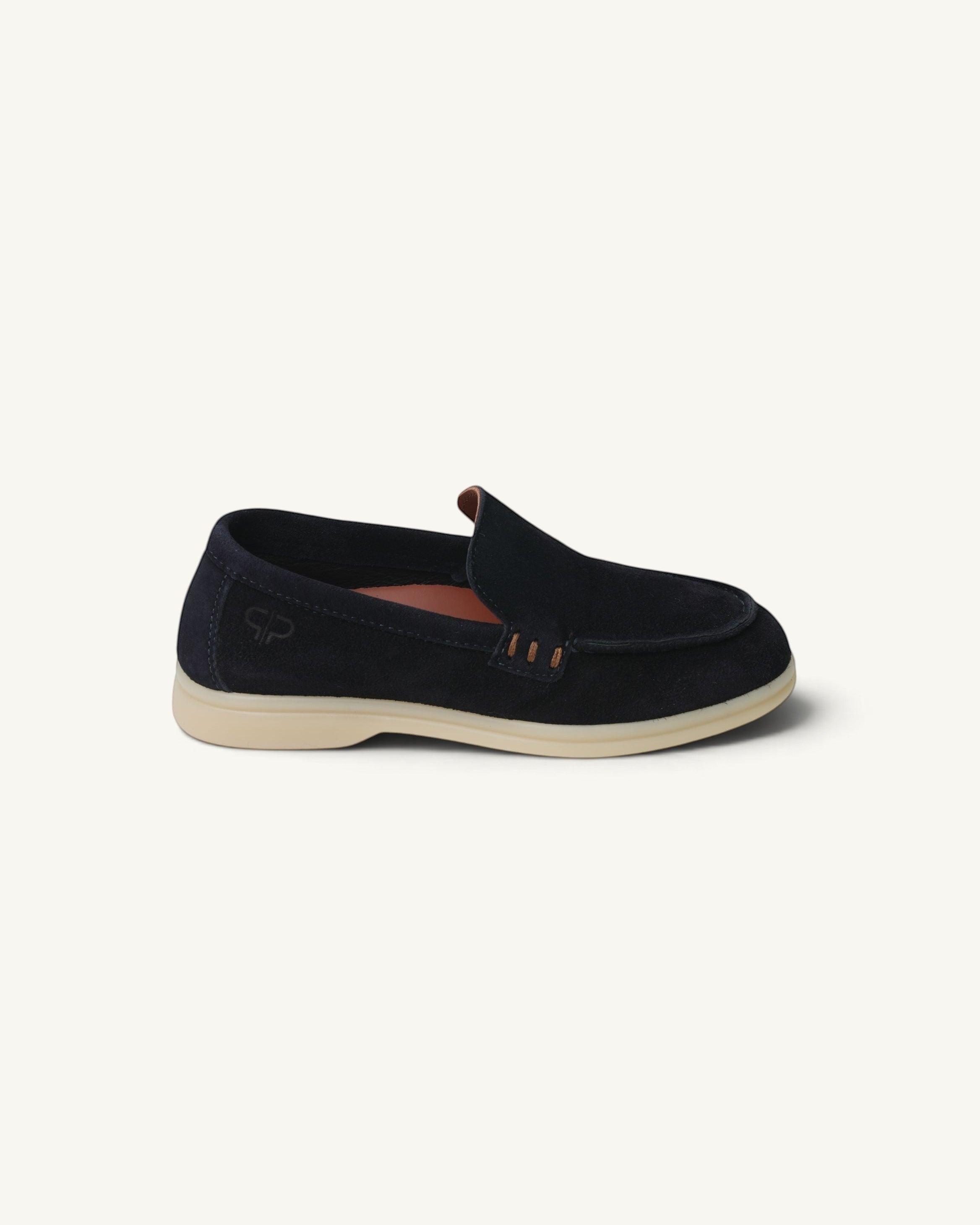 Prestige kids unisex navy blue suede loafers with a light beige rubber sole and side logo detail