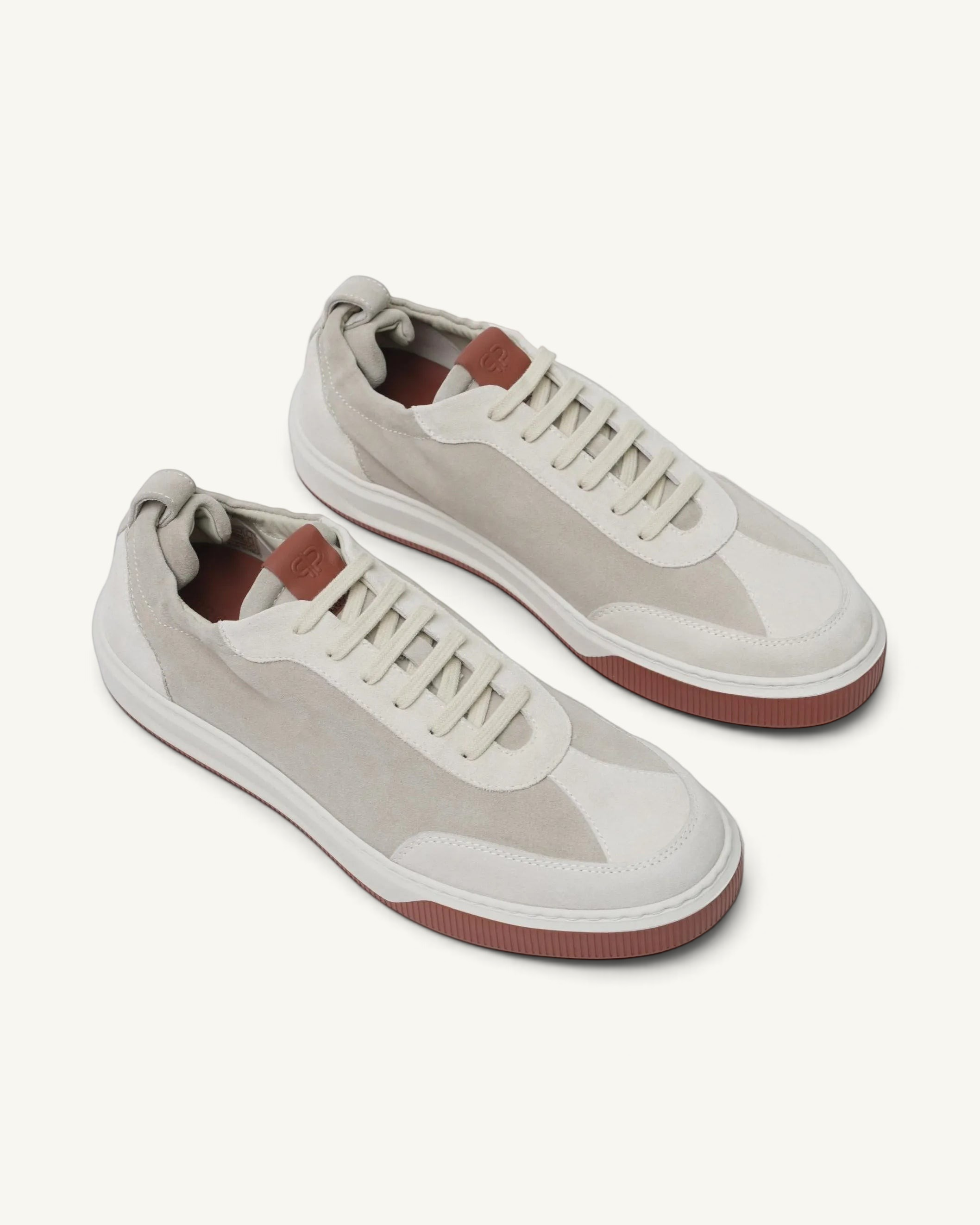 Prestige Legacy Walk Reverse men's sneakers in beige suede with a contrasting brown rubber sole and tongue detail.