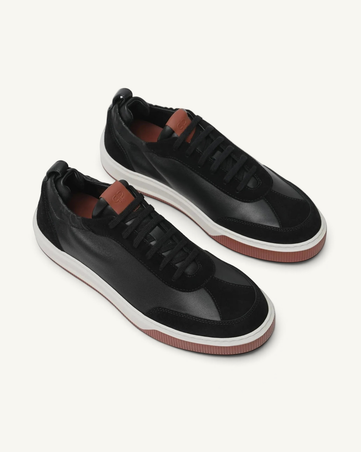 Prestige Legacy Walk Reverse men's black leather and suede sneakers with a brown tongue and textured rubber sole.