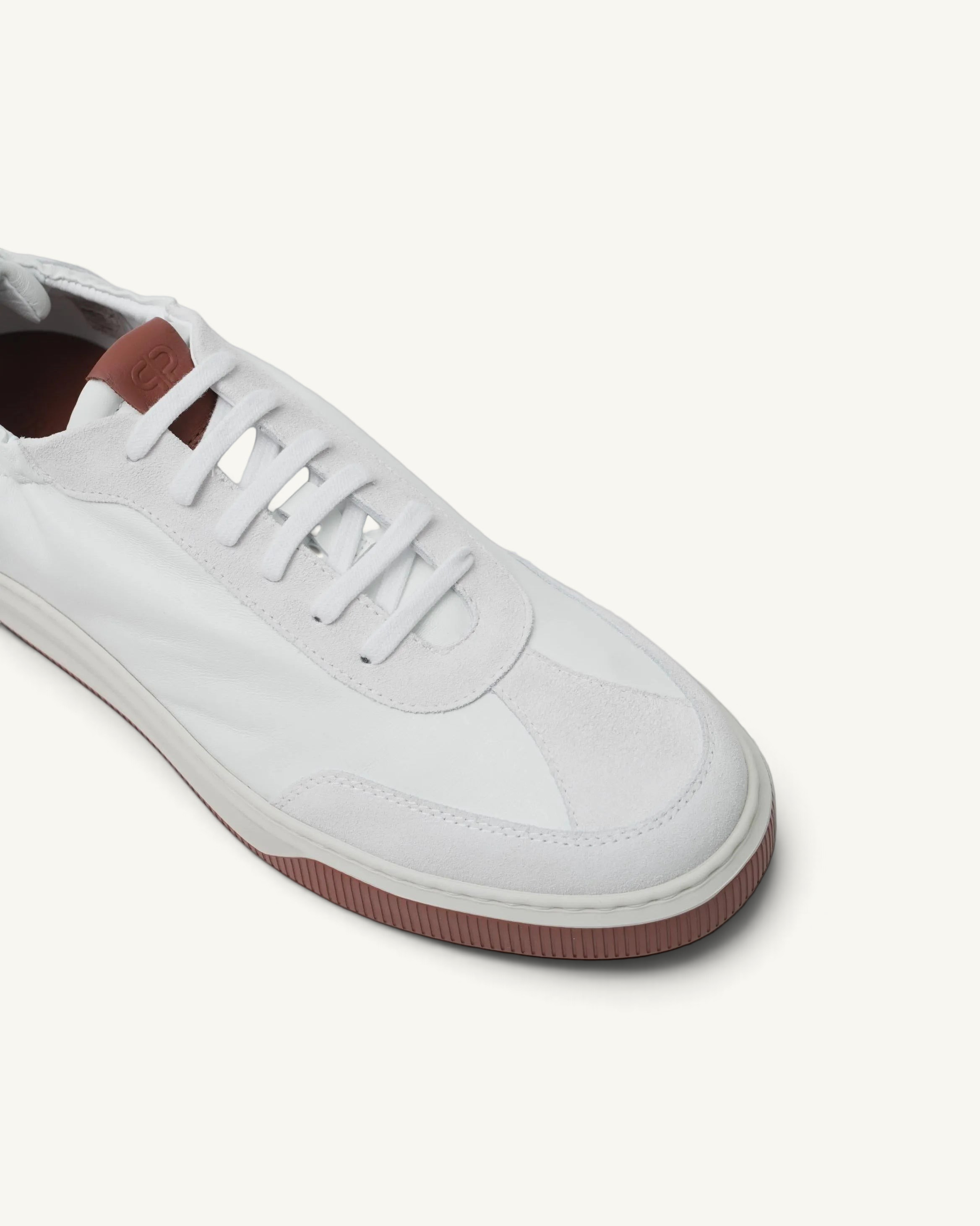 Prestige Legacy Walk Reverse men's white leather and suede sneaker with a brown tongue tab and gum rubber sole