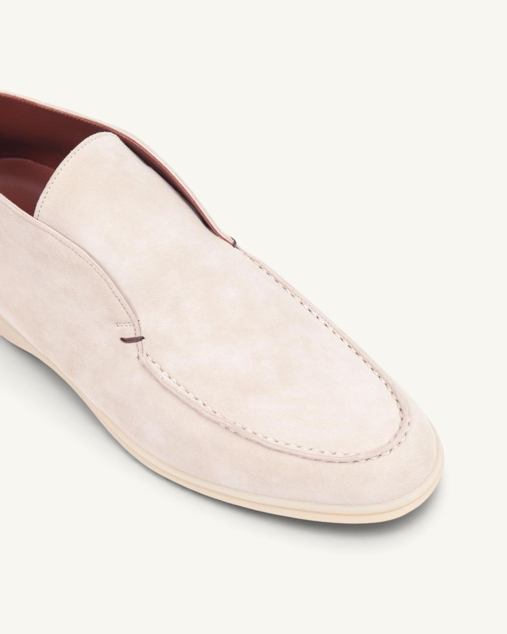 Prestige light grey suede ankle boot with a sleek slip-on design and moccasin-style stitching