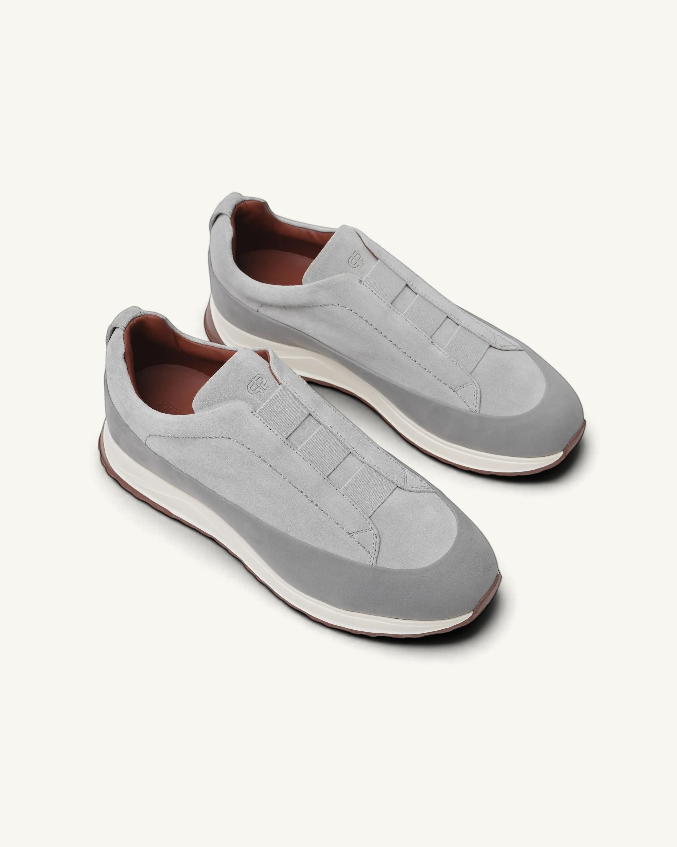 Prestige Monte triple stitch velour sneakers in grey with a sleek slip-on design and white rubber sole.