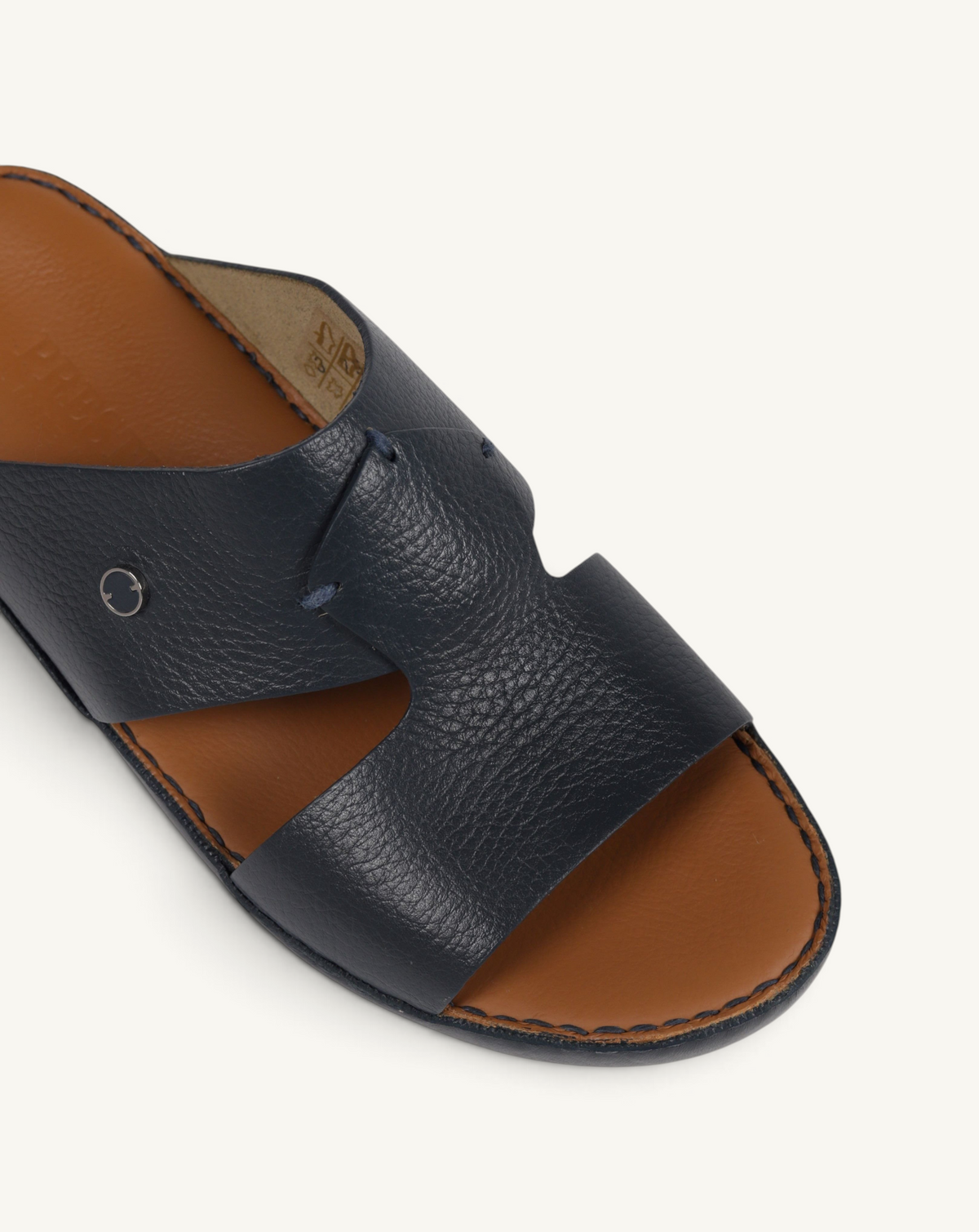 Prestige P3326 Legacy Trotter Aero navy blue leather slide sandals with a tan footbed and metallic logo detail