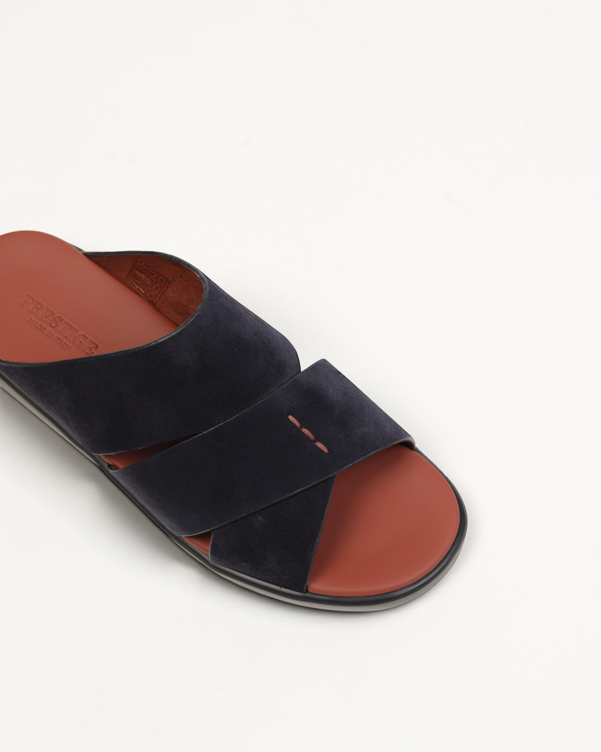 Prestige PVNL-XL3 velour abisso slide sandals in dark navy suede with a brown leather footbed and cross-strap design.