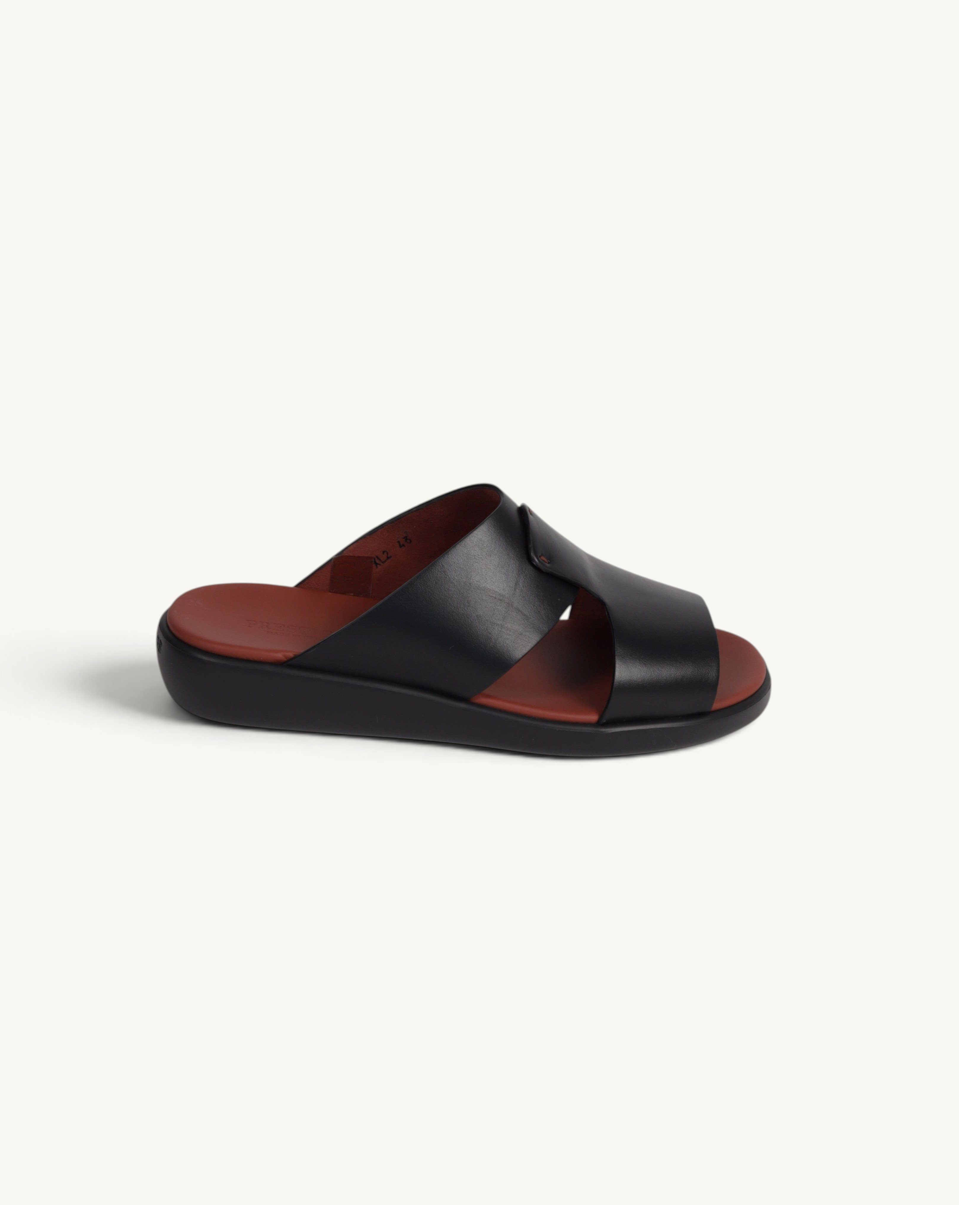 Prestige PG-XL2 Gommato black leather slide sandals with a contrasting brown footbed and thick black sole