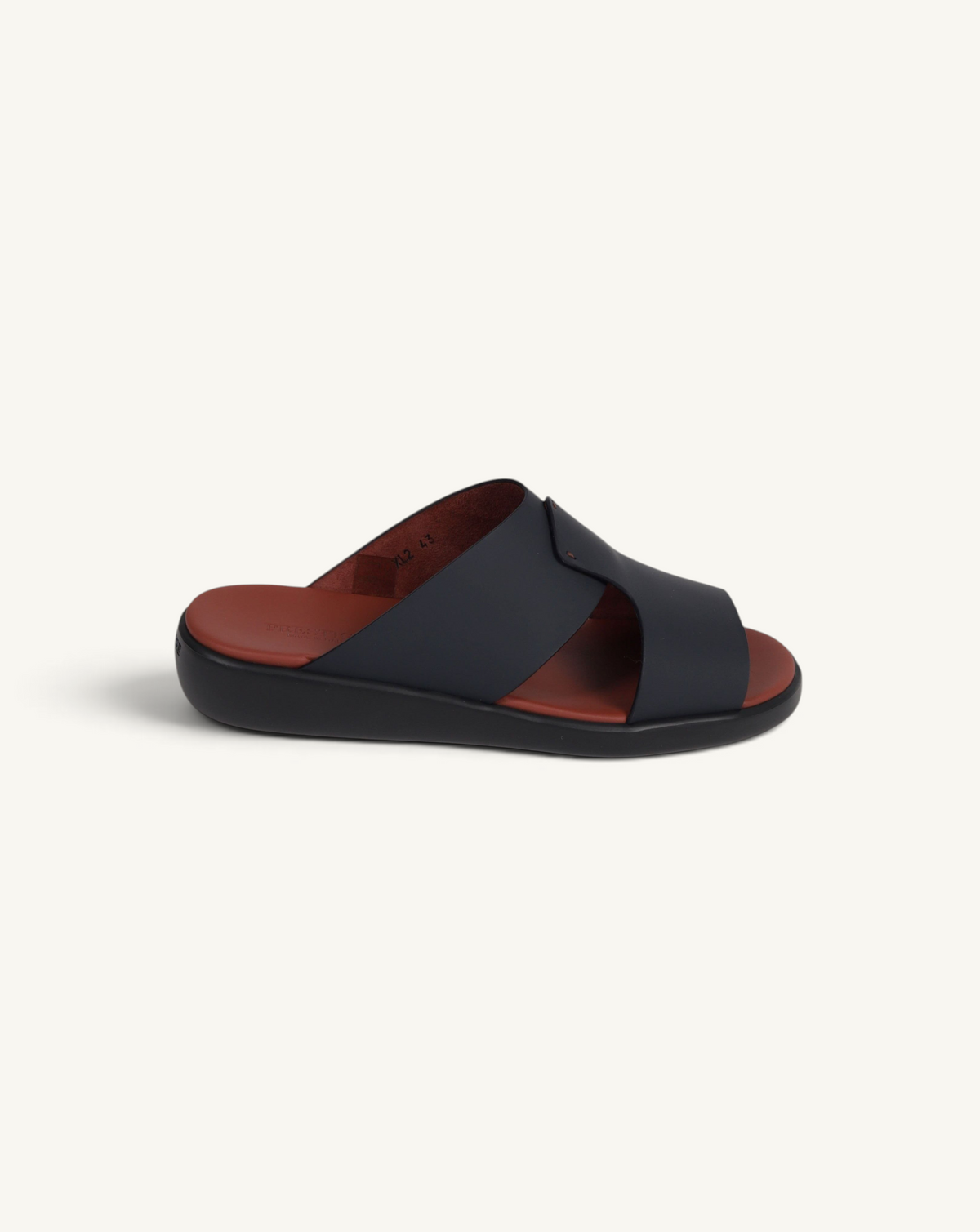 Prestige PG-XL2 slide sandal in dark blue gommato leather with a contrasting brown footbed and black sole.