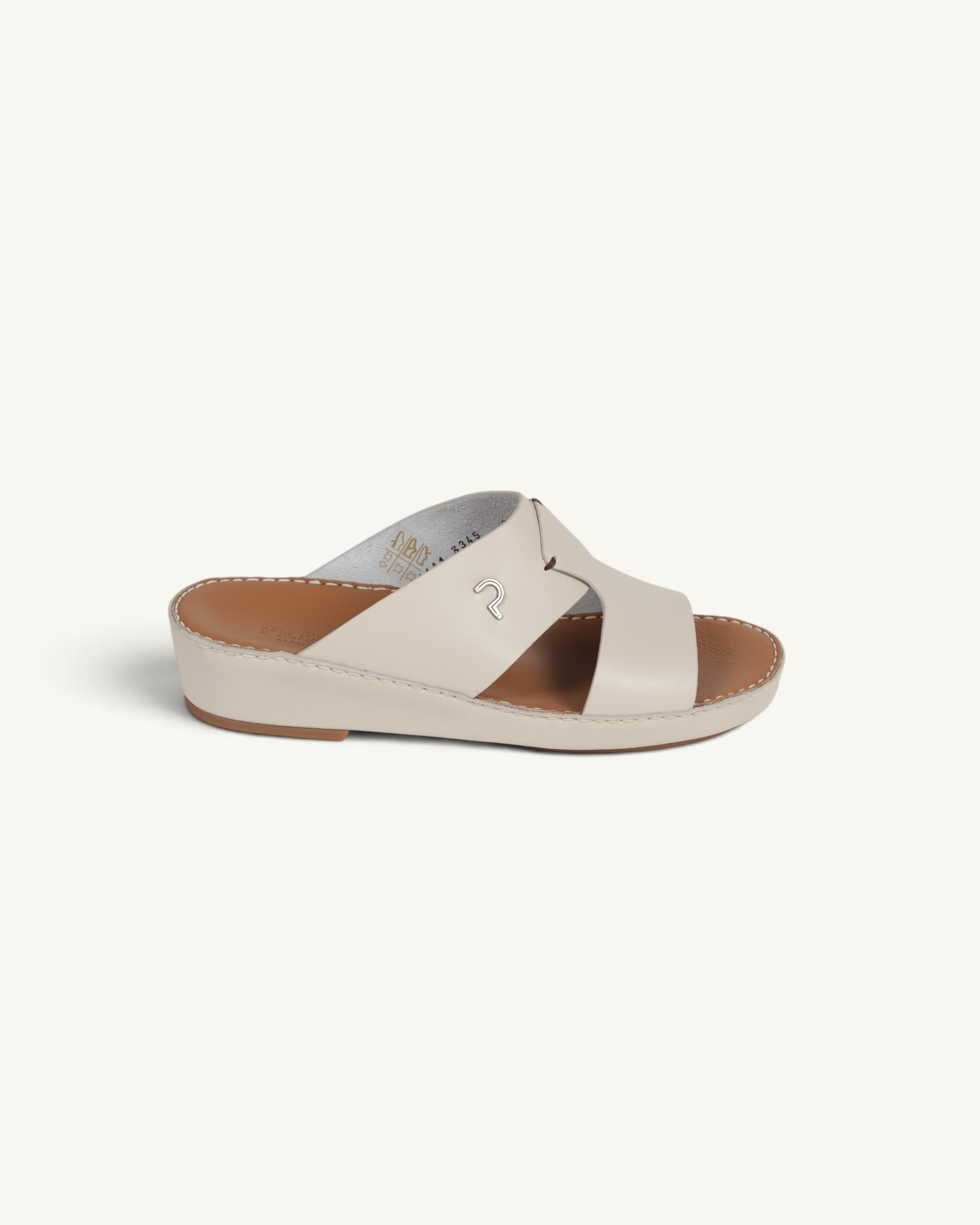 Prestige P3345 Phantom NC milk leather slide sandal with a low wedge heel and metallic logo detail