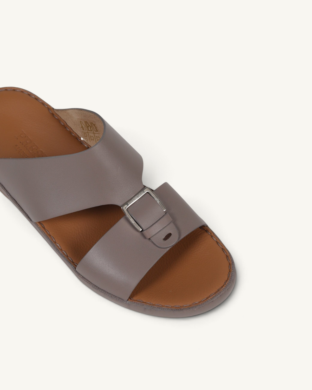 Prestige P3344 Phantom mink leather slide sandal with a silver-tone buckle detail and tan leather footbed.
