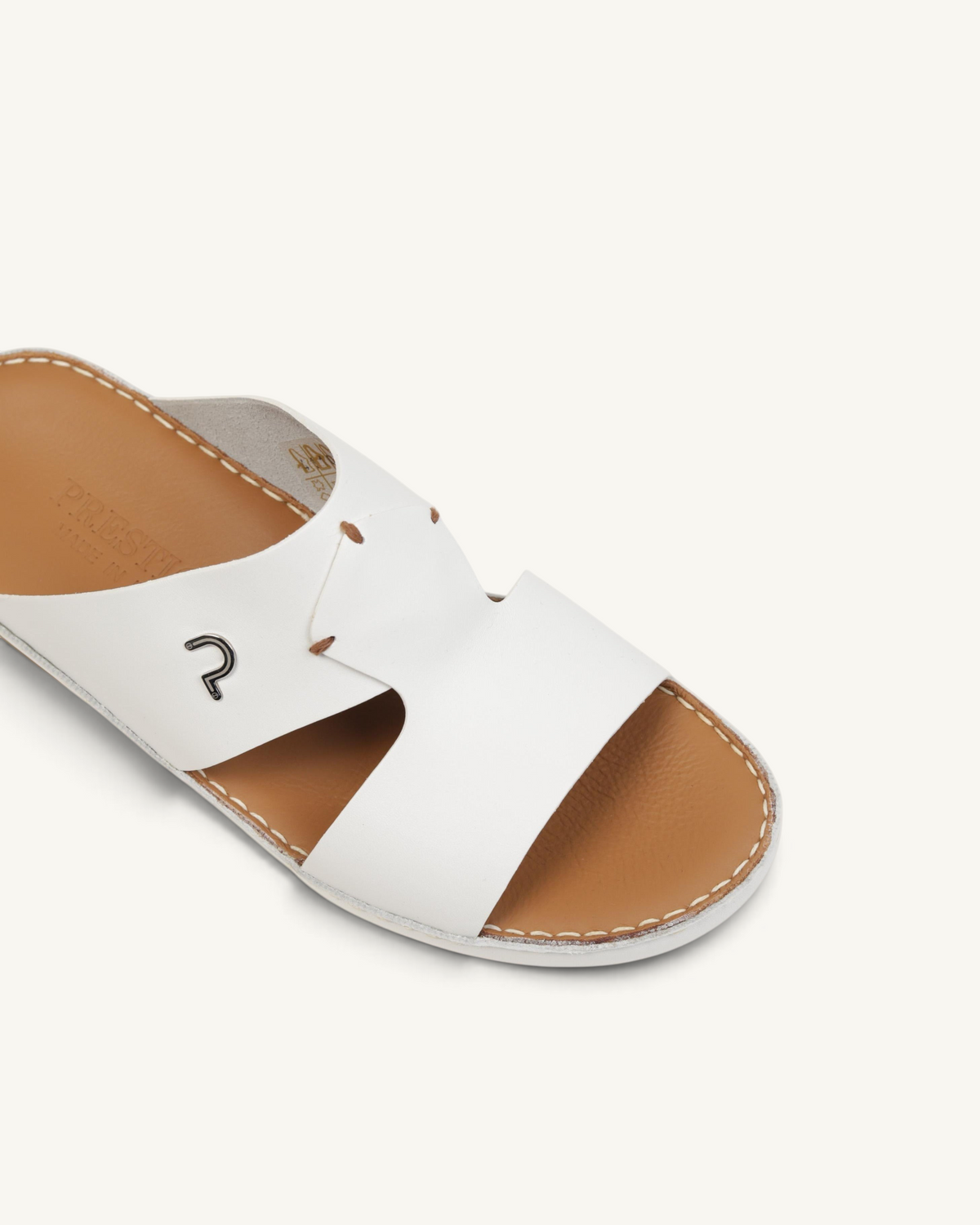 Prestige P3345 Phantom NC white leather slide sandals with a tan footbed and signature logo detail