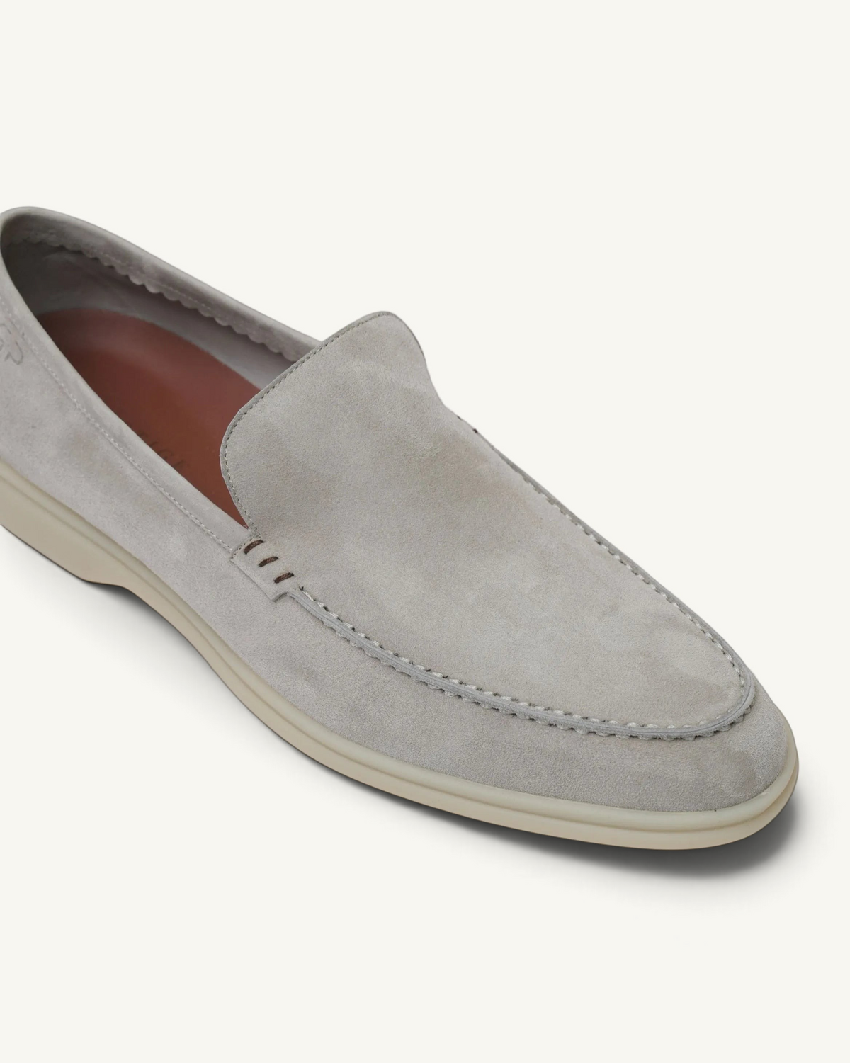 Prestige PSM092S Loafer Walk slip-on shoe in rock grey suede with a tonal rubber sole and moccasin-style stitching.