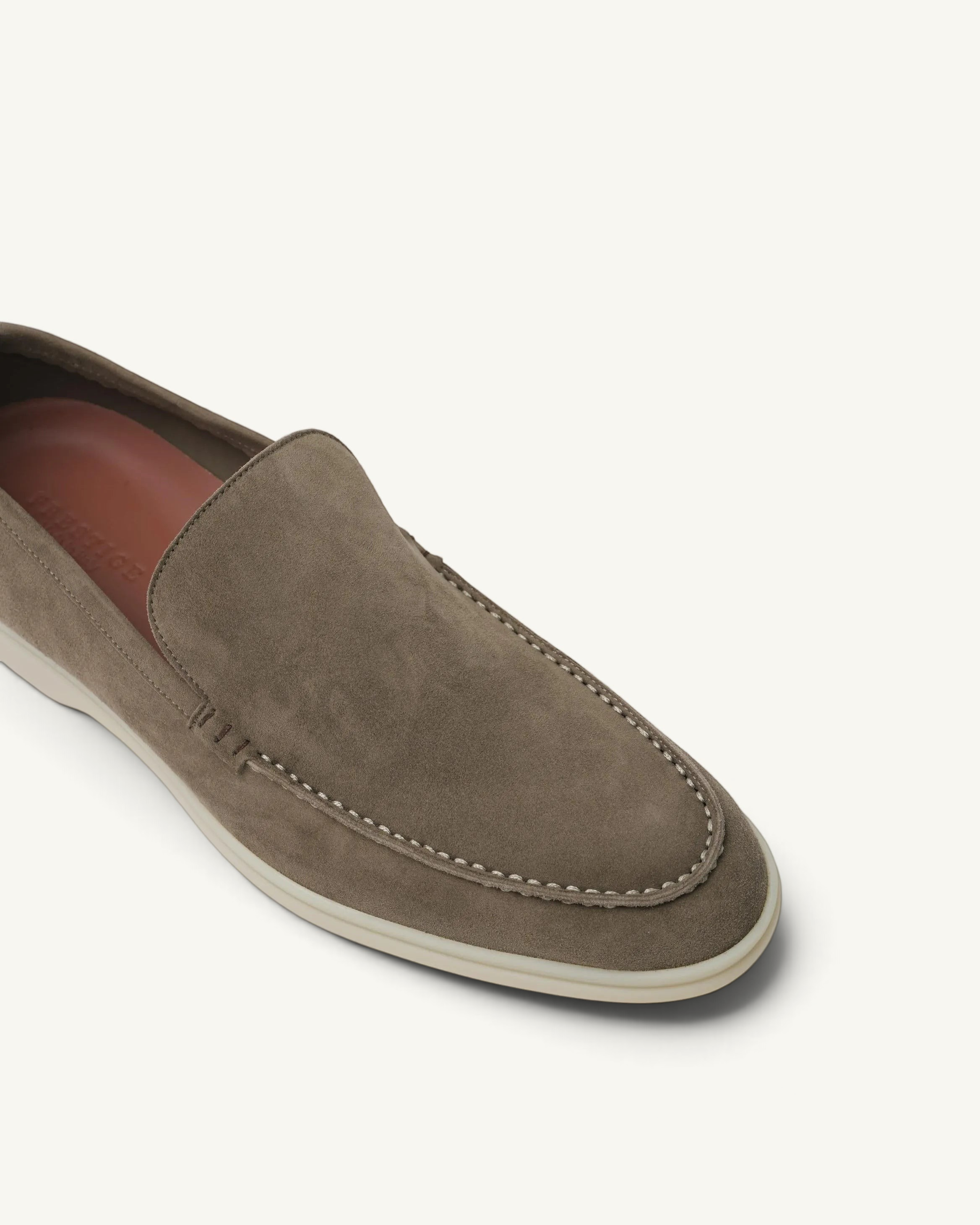 Prestige taupe suede men's summer loafer with white contrast stitching and a flat rubber sole