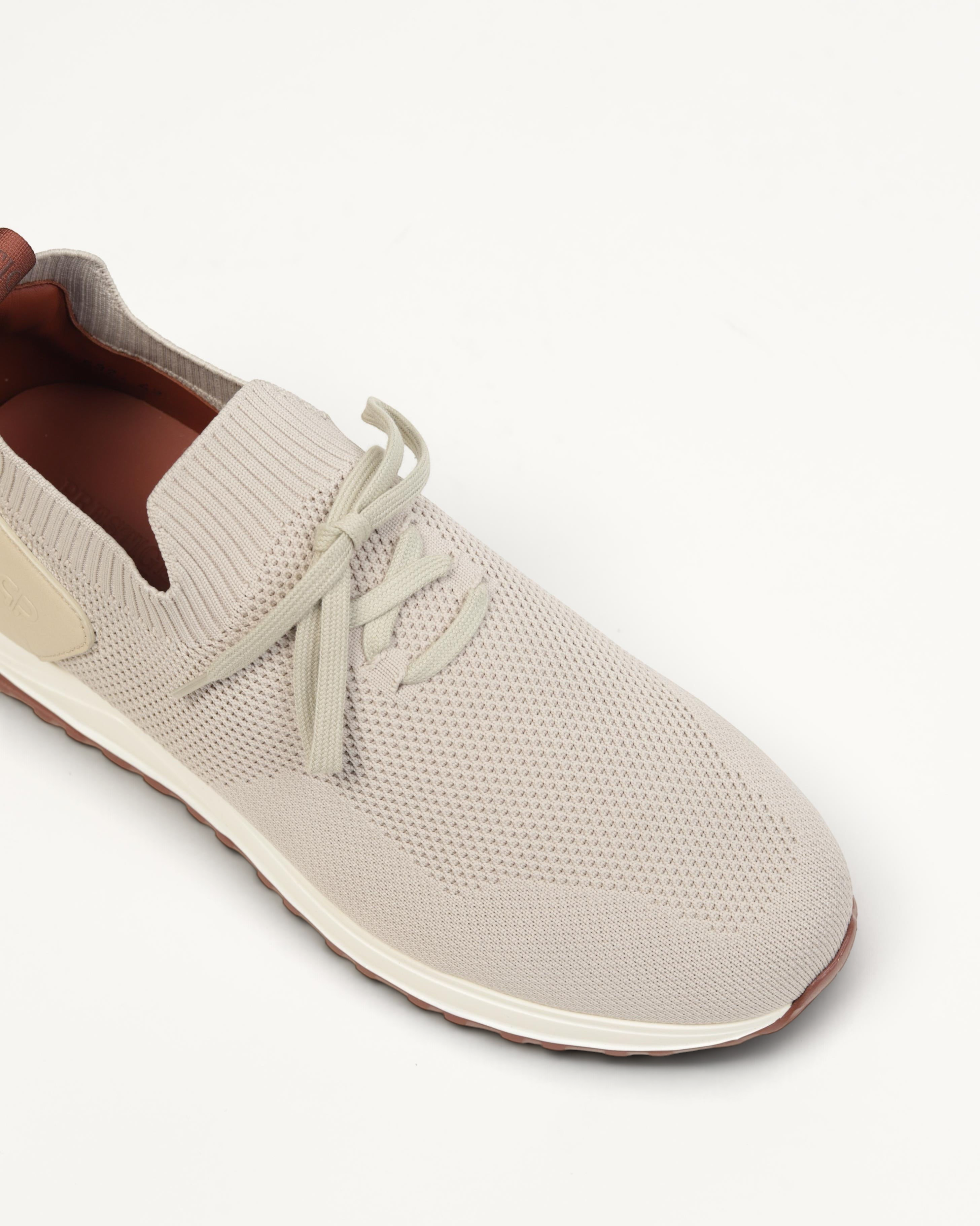 Prestige XLR Fame Walk XL sneaker in warm grey knit fabric with a lace-up design and brown leather accents.