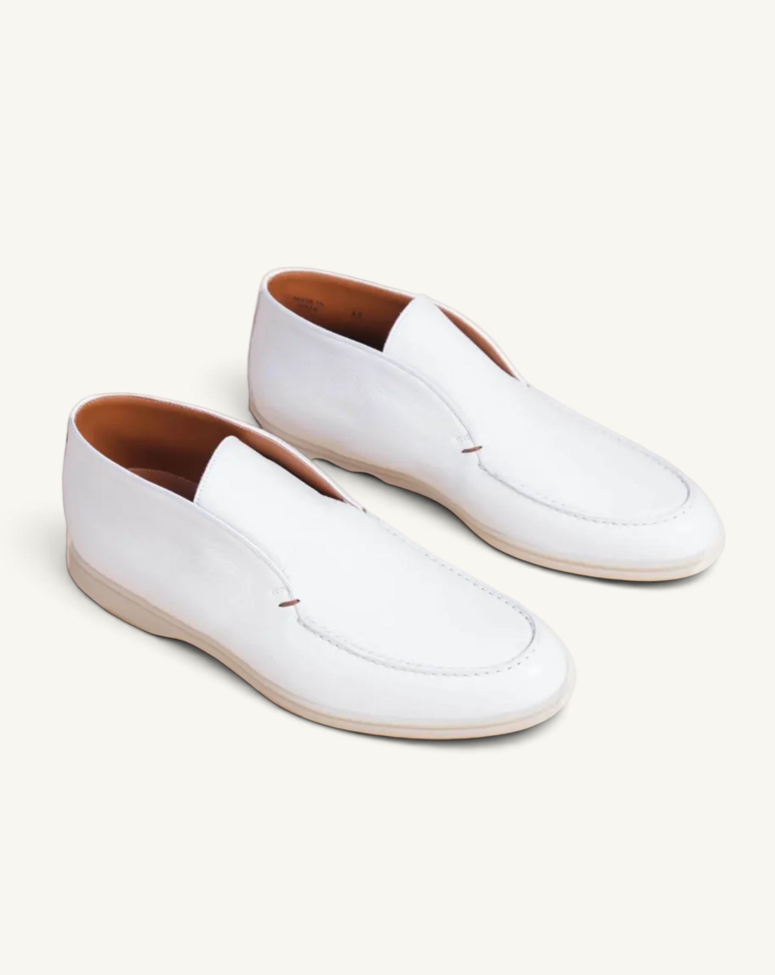 Prestige PDL092C ankle boots in white deer leather with a minimalist slip-on design and light-toned sole.