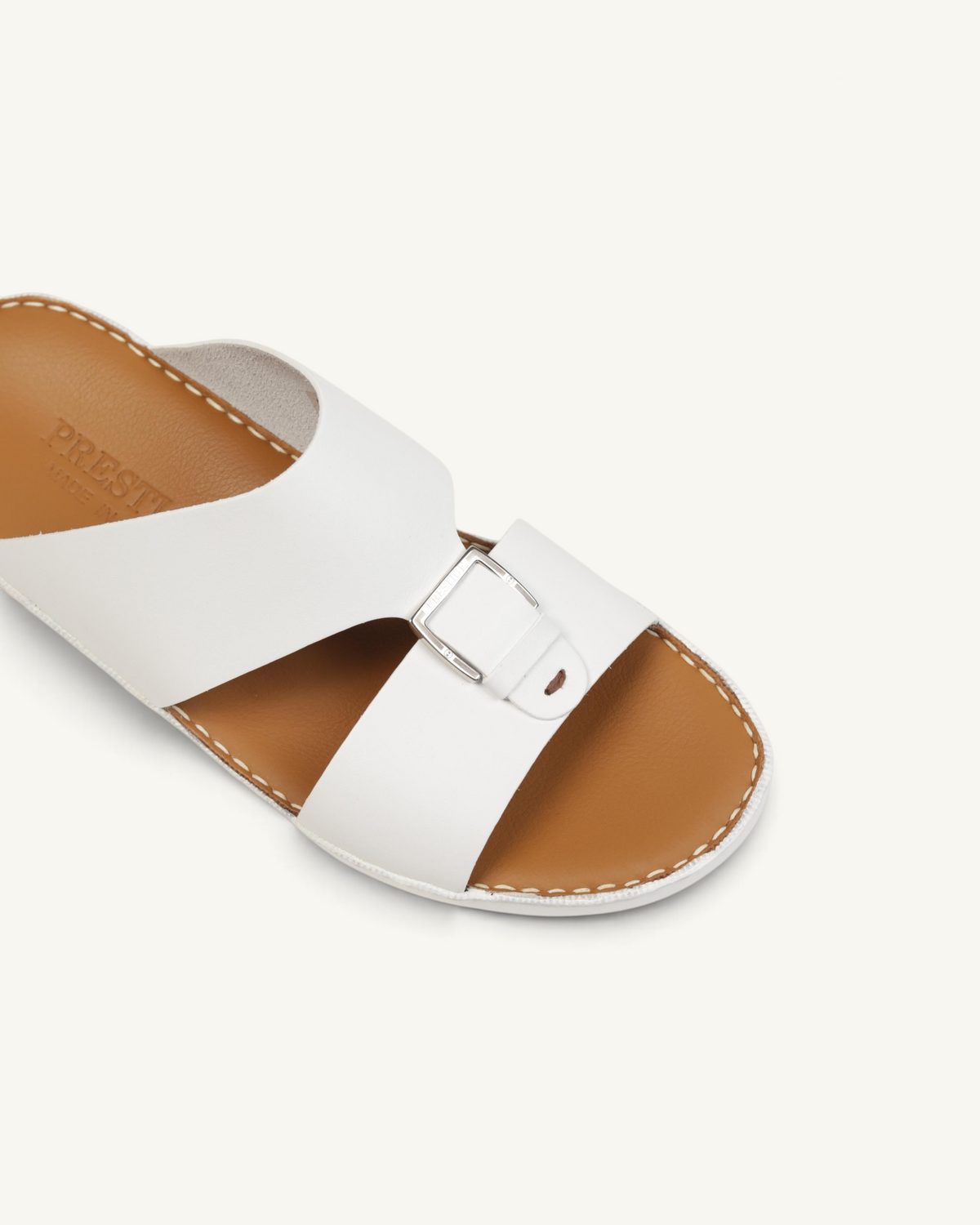 Prestige P3344 Phantom NC white leather slide sandal with a silver buckle and tan footbed