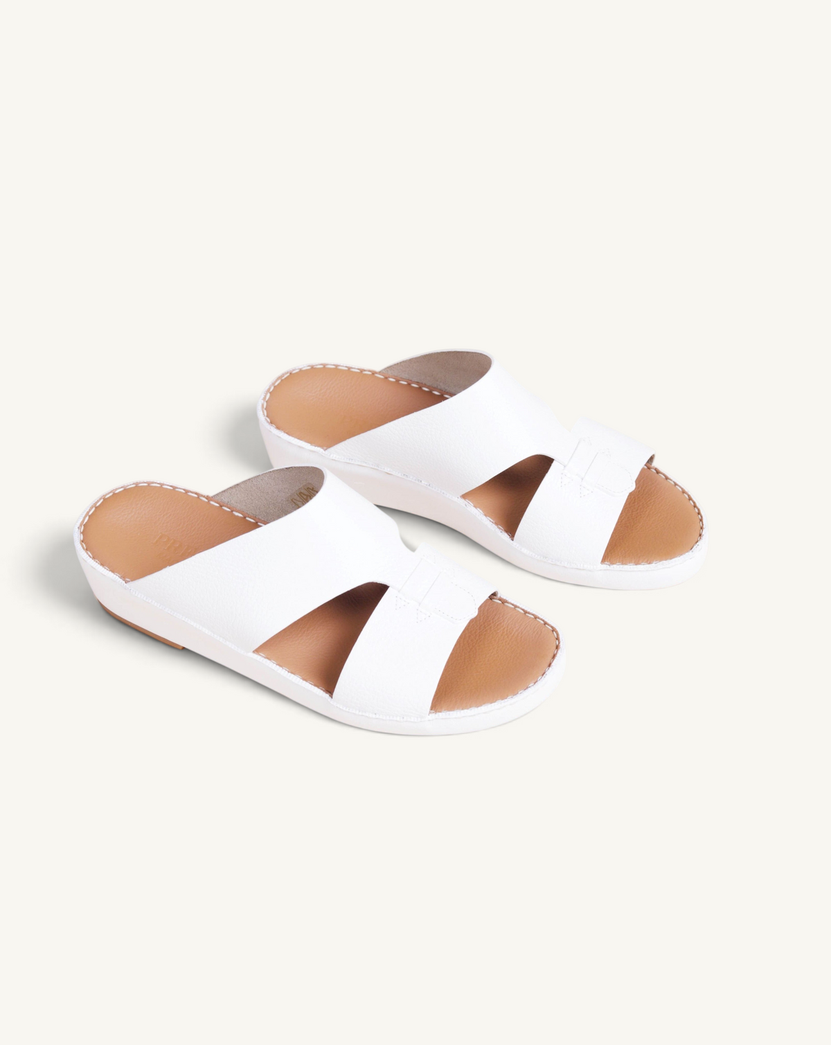 Prestige P3306 Elegance Trotter white leather slide sandals with a comfortable tan footbed and wide strap design.