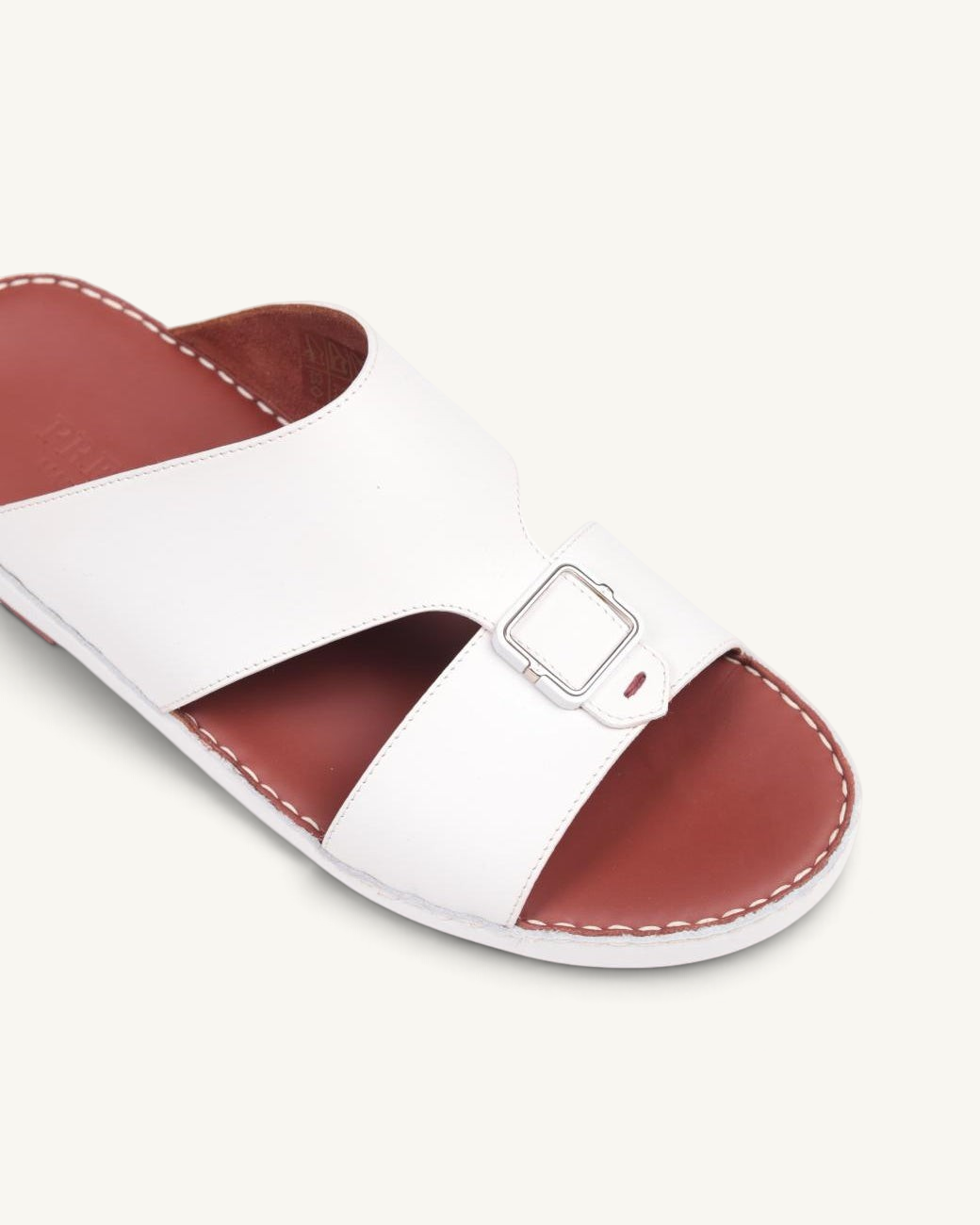 Prestige P3439 Legacy Lux white napa leather slide sandal with a silver buckle and contrast brown footbed