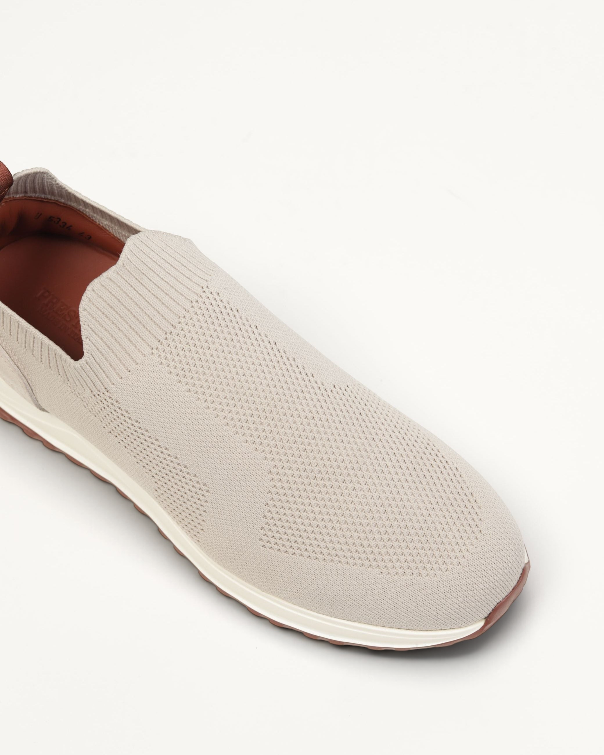 Prestige XLR Maverick active slip-on sneaker in beige knit fabric with a white sole and brown leather heel detail
