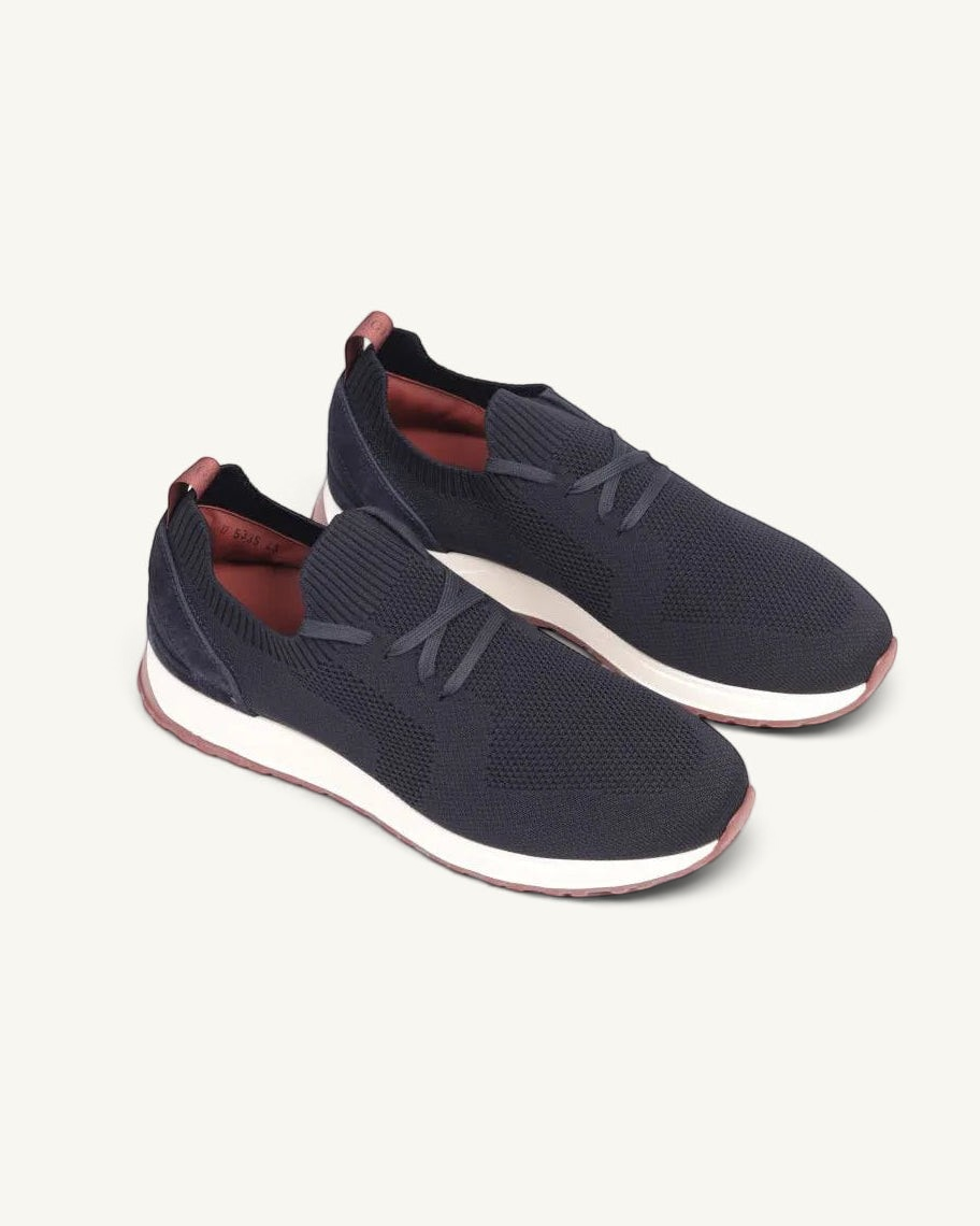 Prestige XLR Maverick Walk XL sneakers in navy blue knit fabric with a white midsole and maroon accents.